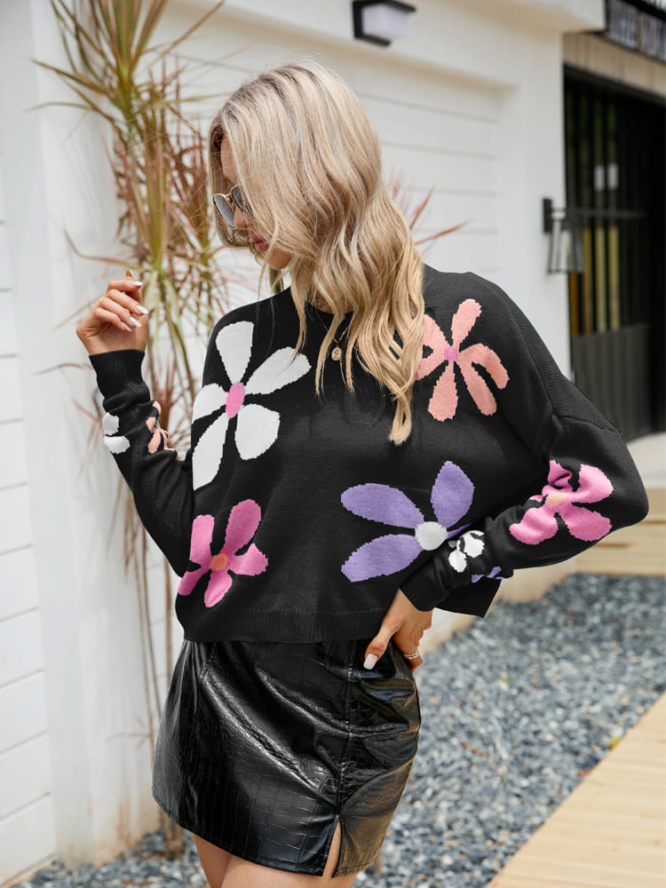 Pull ample à col rond et motif floral