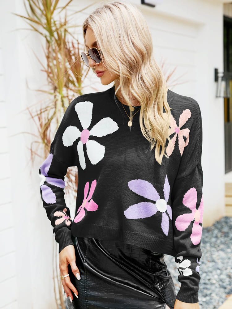 Pull ample à col rond et motif floral