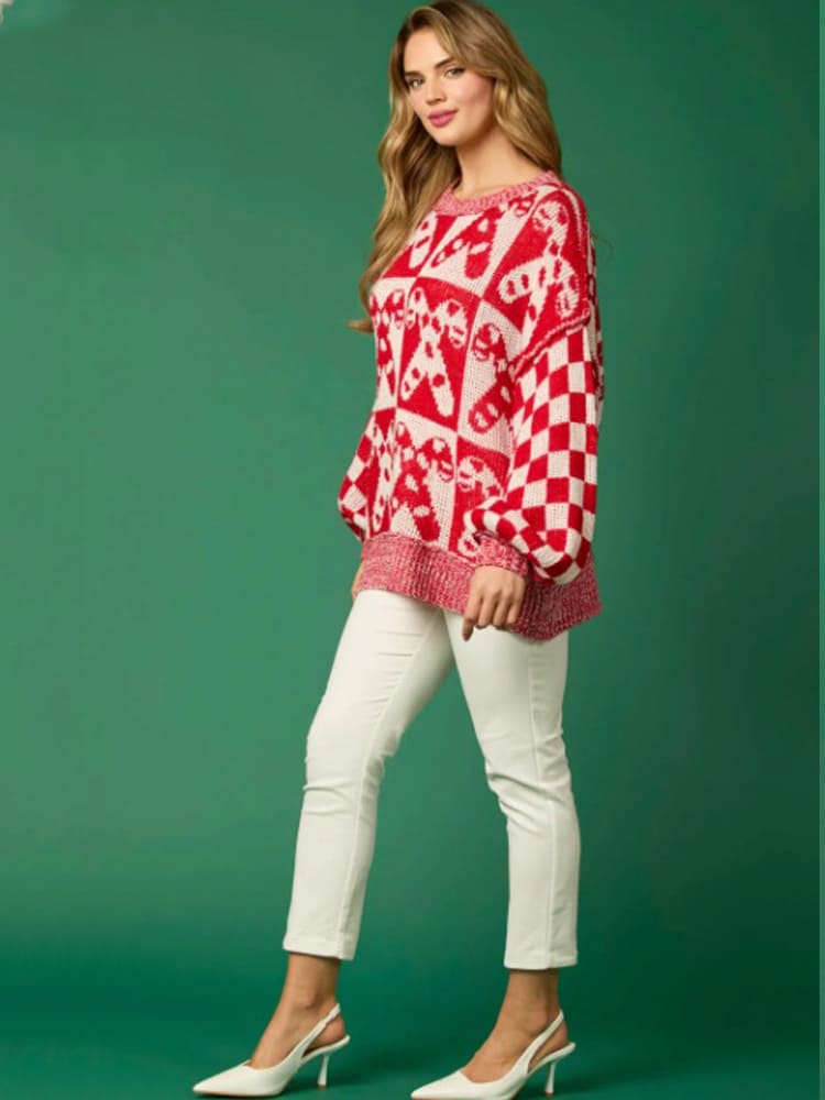 Pull de Noël en tricot avec motif canne à sucre