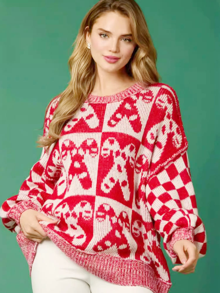 Pull de Noël en tricot avec motif canne à sucre