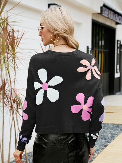 Pull ample à col rond et motif floral