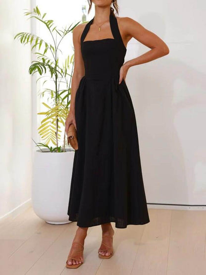 Robe mi-longue noire à col licou et taille basse