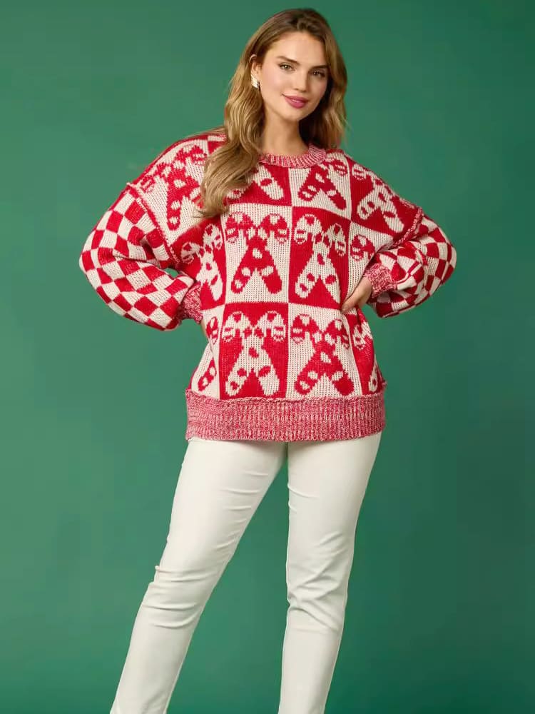 Pull de Noël en tricot avec motif canne à sucre