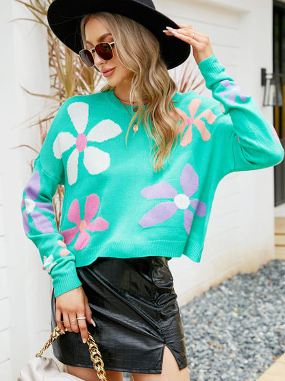 Pull ample à col rond et motif floral