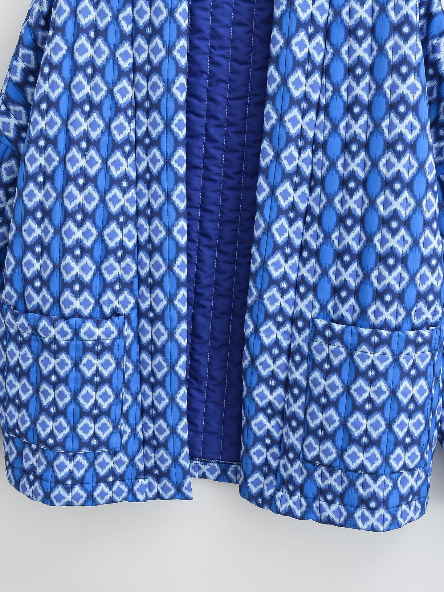 Veste matelassée à poches et imprimé floral à motifs géométriques