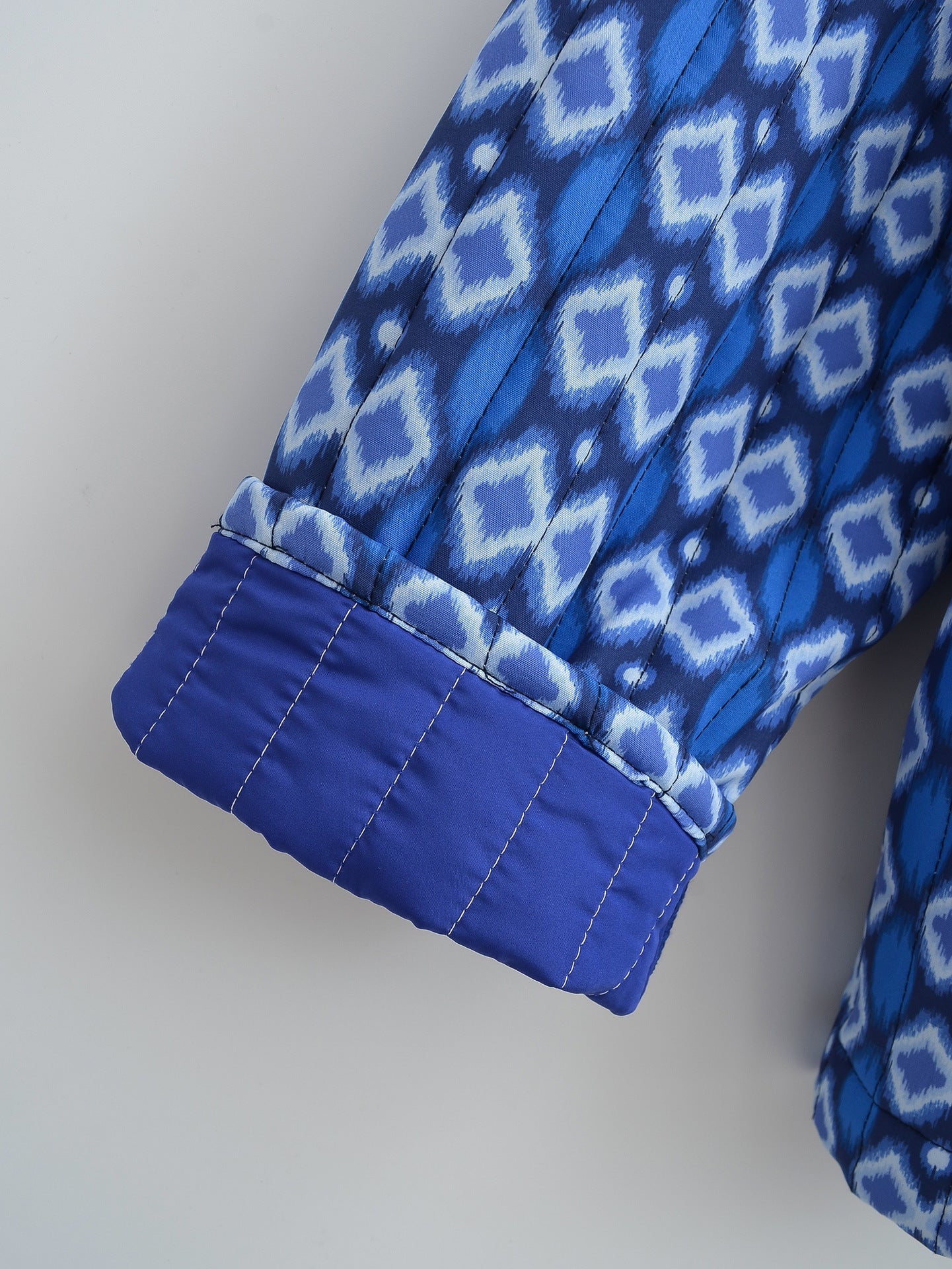 Veste matelassée à poches et imprimé floral à motifs géométriques