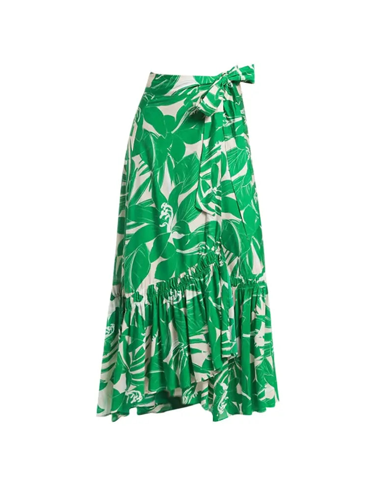 Maillot de bain une pièce vert à décolleté en V profond et dos nu